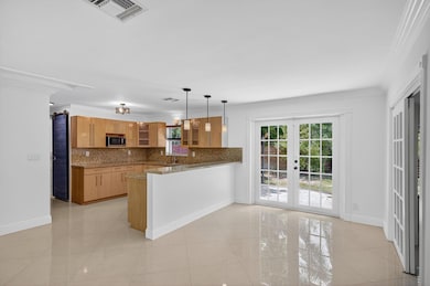 The Kitchen features an open concept that seamless