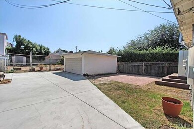 BACK YARD W/ 2 DET CAR GARAGE