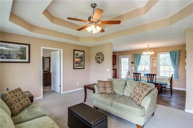 Open floor plan.  Living area has a beautiful, trey ceiling & ceiling fan.  