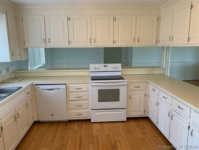 Bright, open kitchen with updated appliances, lots