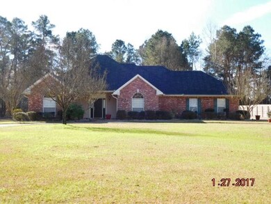 closer view with brick, covered porch, 3 year old 