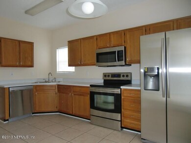 KITCHEN WITH NEW STAINLESS APPLIANCES