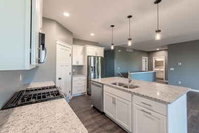 Photo of previous model - Stainless steel appliance package plus 9 foot ceilings on the main level!