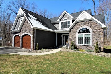 Charming exterior with stone accents, shake shingl