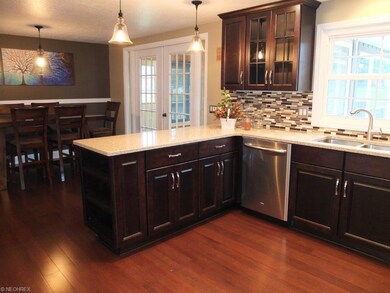 Kitchen open to the dining room is great for enter
