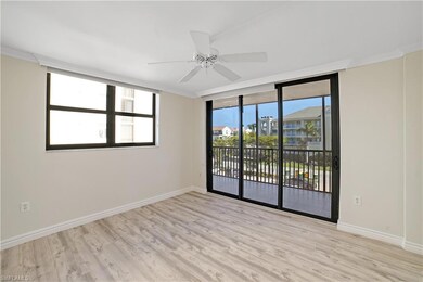 Spare room featuring ceiling fan, light wood-type 