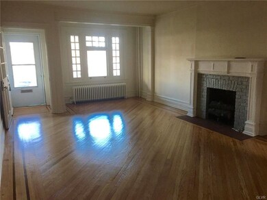 Freshly finished hardwood floors. Gas fire place d