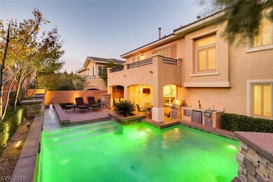 Resort Inspired Backyard-Pebble Decking with Cobbl
