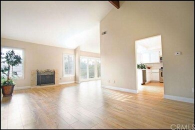 Large living room with soaring cathedral ceilings 