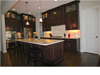 Beautiful kitchen with large island, eating bar, s
