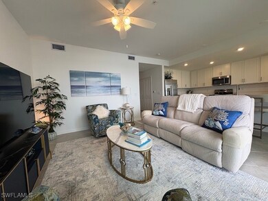 Great Room with Reclining Sofa, 65” TV, Ceiling Fan