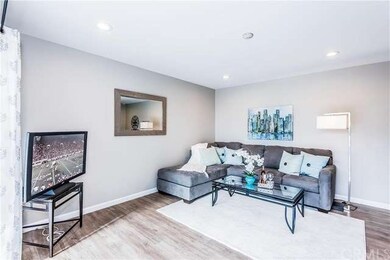 Spacious living area opens to outdoor patio with o