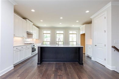 Kitchen with appliances with stainless steel finis