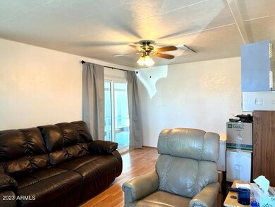 LIVING ROOM VIEW FROM DINING AREA TO 2ND