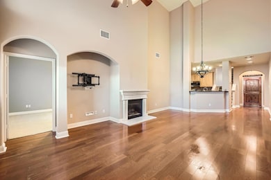 Unfurnished living room with baseboards, visible 