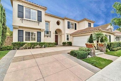 L Shaped Driveway with 2 Car Garage