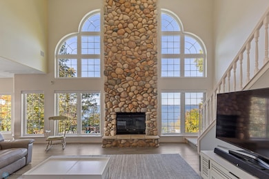 Custom Stone Floor to Ceiling Fireplace