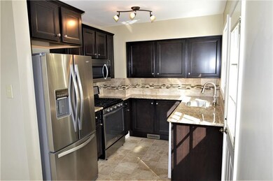 Completely updated kitchen with newer dark stained