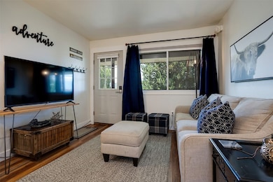 Living area featuring wood finished floors