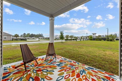 Covered Patio offers a serene pond view of communi
