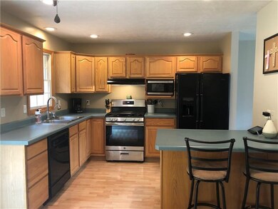Built-in island is perfect spot for breakfast and 