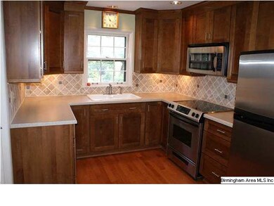 Cabinetry, counter tops, appliances, floor and bac