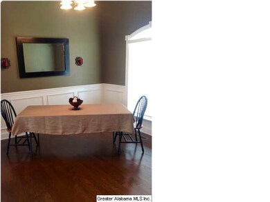 Formal dining room with high ceilings