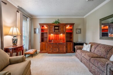The formal living room, is to your left as you enter  This could easily convert to a large study.