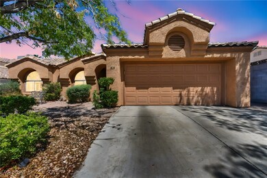 Mediterranean / spanish-style house featuring a ti