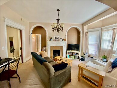 1st Floor Apartment:  Living room with an archway