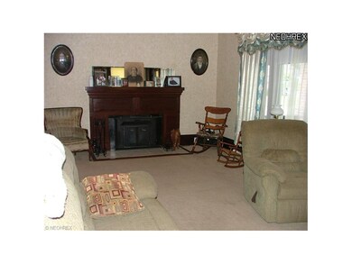Living room with fireplace. Gorgeous original wood
