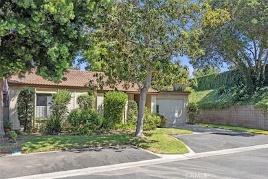 Charming end unit off gate 7 in Laguna Woods
