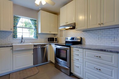 Kitchen updates include cabinetry, quartz countertops, SS appliances, and subway style back splash.