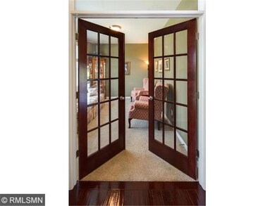 Main level office/den with french door entry.