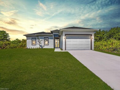View of front of property featuring a yard and a g