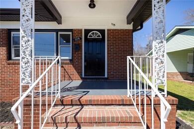Property entrance with brick siding