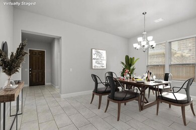 Dining room with an inviting chandelier