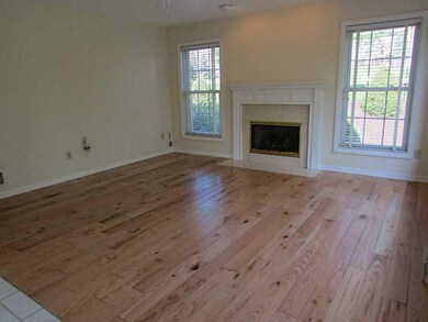 Family Room. Hand scraped oak hardwood, large wind