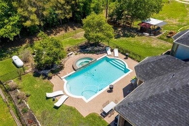 View of pool with a patio area, a yard, and an in 