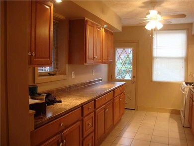Kitchen. LOTS OF CABINET AND COUNTER SPACE. BACK D