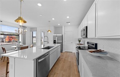 Interior photos are of a staged model home. Illust