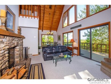 Wall of Windows/Beamed Ceiling