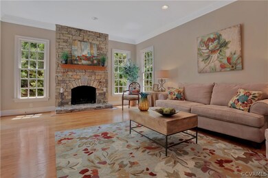Family room open to kitchen and faces the rear yar