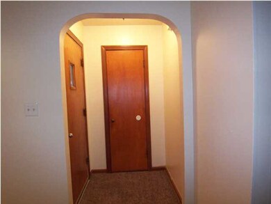 Foyer with walk in hall closet,