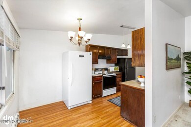 Dining Area & Partial Kitchen View
