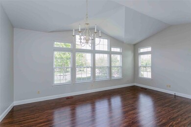 Dining with hardwood and reverse vault