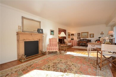 Decorative fireplace is focal point.