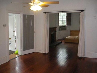 Living Room. Sunroom to the left, viewing into BR.