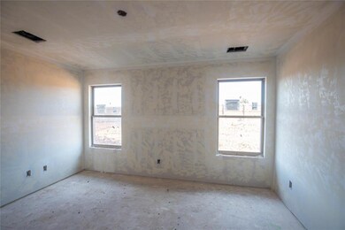 Spare room featuring plenty of natural light