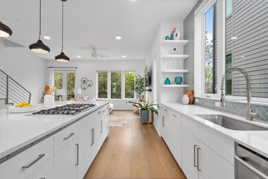 Kitchen with ceiling fan, appliances with stainle
